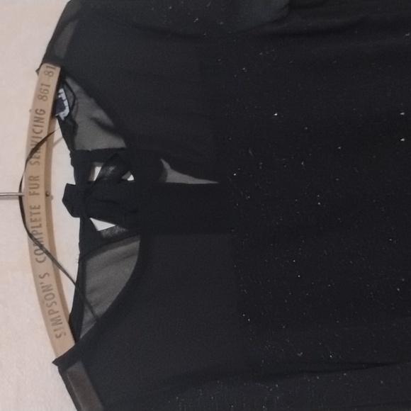 Sheer sparkle top with keyhole bow tie back and sheer panel neck and hem - Picture 3 of 8